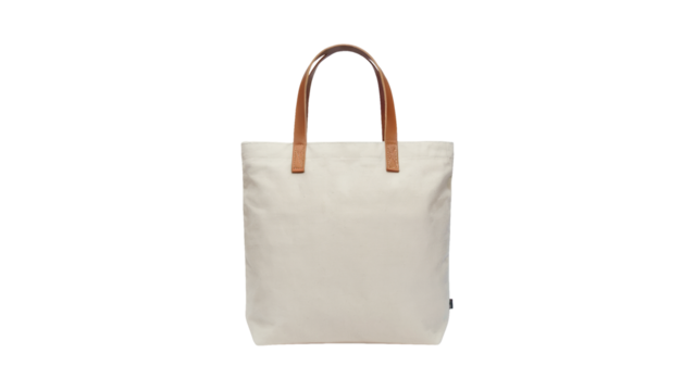 Stylish reusable canvas tote bag with leather handles for eco-friendly shopping and everyday carry, perfect for branding mockups and sustainable living Isolated on white or transparent PNG.