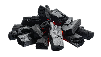 Stack of charcoal, embers glowing. Dark, ready for BBQ