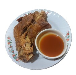 isolated Fried pork leg with sweet chili sauce