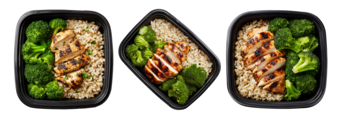 Healthy grilled chicken, brown rice, and broccoli in a black plastic meal container isolated on white transparent background