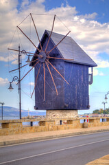 Wooden windmill a tourist attraction in the old city of Nessebar in Nessebar, Bulgaria, Europe