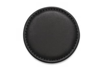 Round black blank leather patch or coaster with stitches, isolated on transparent background, for branding mockup