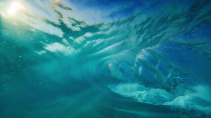 Undersea view, showing clear water, waves, and the sun's reflection. A unique perspective showcasing a vast expanse of pure ocean Stock Video