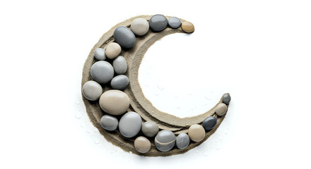 Crescent moon shape formed with smooth stones and sand on a white background in a studio shot