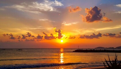 A breathtaking ocean sunset, with sun rays piercing through clouds. Figures and boats are silhouetted against the horizon