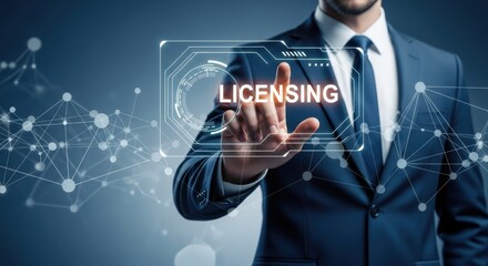 Man pressing a licensing button on a futuristic interface hologram screen represents technology business legal issues and intellectual property
