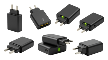 Collection of black USB and wall plug adapters with green LED indicators
