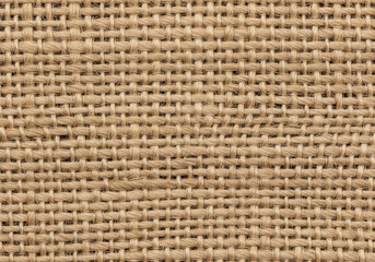 Closeup of a woven burlap sack texture, showcasing the intricate details and natural fibers of the material