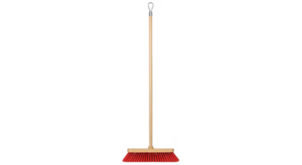 Broom With Red Bristles And Wooden Handle Isolated On Black