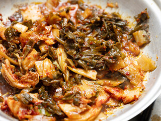 Stir-fried kimchi in a pan