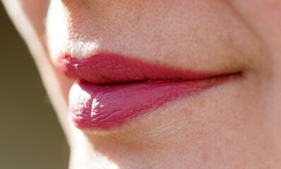 A woman's lips are red