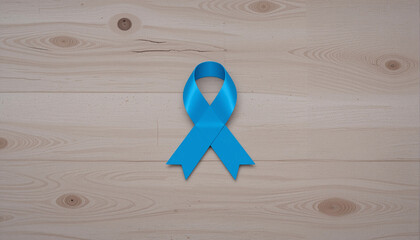 Blue awareness ribbon on a wooden surface representing diabetes support and advocacy
