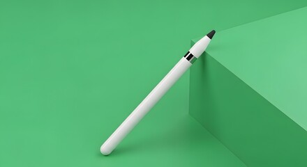 A white marker pen leaning against a green paper surface with a shadow cast on the background, suitable for creative or educational themes
