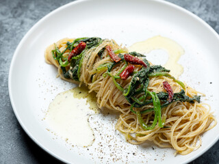 Spicy oil pasta on a plate