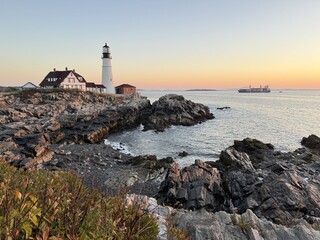 Lighthouse at sunset on the river