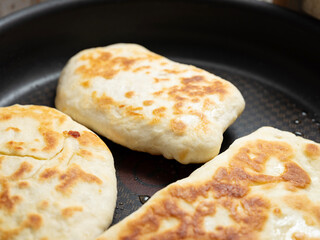 Bread baking in a pan