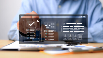 Business person stamping documents with a digital compliance interface showing checklists, legal icons, and approval status. Concept of regulatory compliance and document verification.