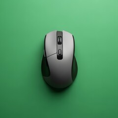 A modern wireless computer mouse with a sleek design placed on a vibrant green background, highlighting its ergonomic shape and functional buttons