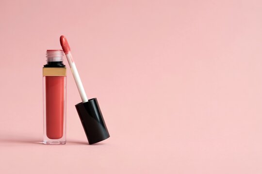 Lip gloss makeup beauty product cosmetics pink background fashion glamour beauty lip gloss makeup product on transparent background