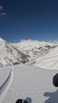 Snowboarder in freeride, Gudauri ski resort, Georgia