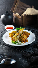 Crispy Asian Spring Rolls with Shrimp and Vegetables Served on a White Plate with Sweet Chili Sauce 2