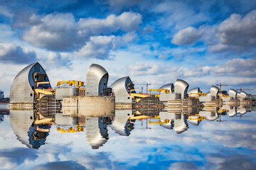 Thames Barrier reflected in the River Thames, London, UK