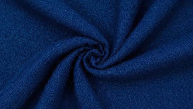 Closeup of soft blue woolen fabric twisted in spiral pattern, cozy textile texture for fashion and design backgrounds