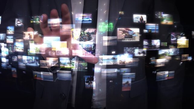 Businessman browsing holographic image gallery using augmented reality interface
