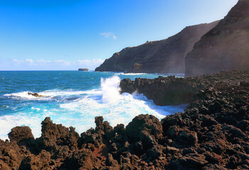 Waves on coast at A Porta do Diabo in Sao Miguel, the Azores - Atlantic ocean landscape with cliff