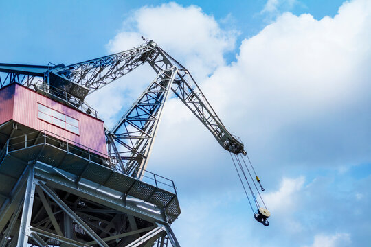 Port crane at shipping terminal