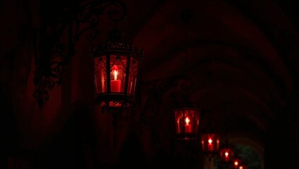 Crimson red lanterns hanging in shadowy gothic corridor