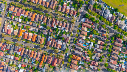 Aerial Panorama Drone View of a inner western Sydney Suburb of Ashbury Urban Sprawl and the terracotta roof tops streets and trees of Suburban Sydney  NSW Australia