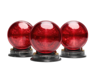 Three red, translucent orbs on gray bases, presented against a stark black background