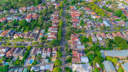 Aerial Panorama Drone View of a inner western Sydney Suburb of Ashbury Urban Sprawl and the terracotta roof tops streets and trees of Suburban Sydney  NSW Australia