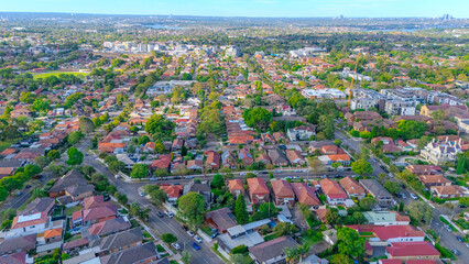 Aerial Panorama Drone View of a inner western Sydney Suburb of Ashbury Urban Sprawl and the terracotta roof tops streets and trees of Suburban Sydney  NSW Australia