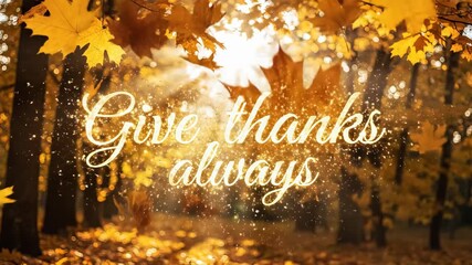 Give thanks always text in a golden autumn forest with falling maple leaves. Thanksgiving holiday concept with natural seasonal beauty.