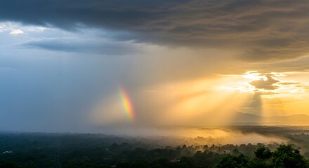 A stunning landscape showcasing a vibrant rainbow emerging from dark storm clouds with golden sunlight breaking through over a lush green forest