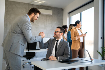 Happy office staff, success employee giving hand for shaking. Business people offering handshake