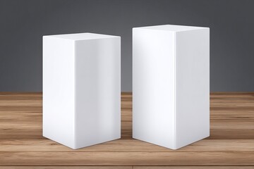 Naklejka premium Two White Boxes on a Wooden Surface with Gray Background.