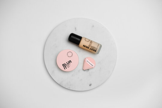 Strasbourg, France - November 2025 : sephora blur it face powder and Best skin ever foundation minimalist product editorial photo flat lay top view on marble podium