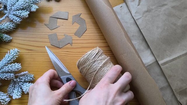 eco-friendly Christmas gift wrapping materials and recycling sign