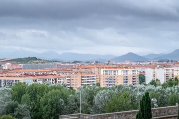 Fototapeta premium Cityscape View of Pamplona Residential Neighborhood and Mountains