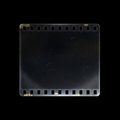 Old, blank projector film frame isolated on black background with copy space, vintage film and analog media