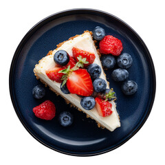 creamy cheesecake topped with berries served in deep navy plate creating rich colorful dessert layout
