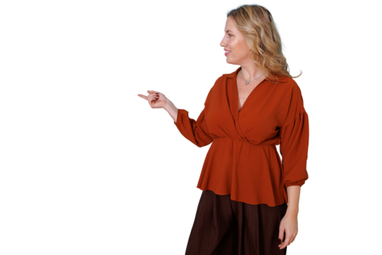 Woman smiling and pointing left, presenting new ideas or promotion, offering direction. Transparent background