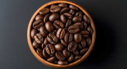 A close-up of freshly roasted coffee beans in a wooden bowl on black background, emphasizing texture and rich aromatic detail