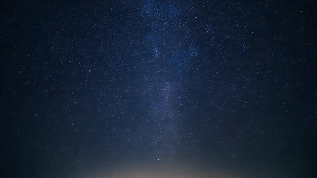A clear night sky filled with countless stars and the Milky Way.