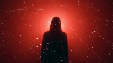 Mysterious female silhouette standing before a glowing red light source. Eerie horror or science fiction concept with vintage film scratches and dust for a thriller banner