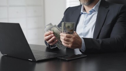 Finance concept with businessman counting dollar bills. Business man count finance. Hands hold money. Business man handling dollar cash. Business finance concept with counting money closeup.