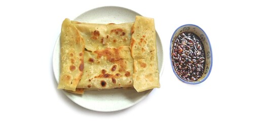 Martabak Telor with Soy Sauce Served On a Plate. Traditional Indonesian Street Food. Food...